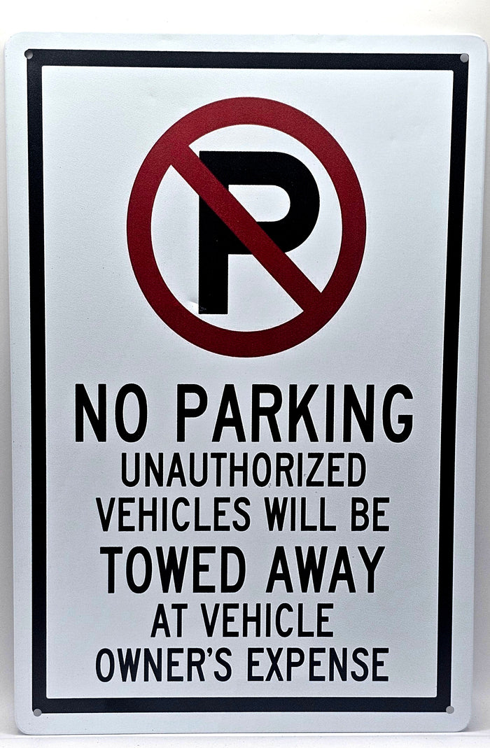 No Parking, Unauthorized Vehicles Will Be Towed Away At Owners Expense