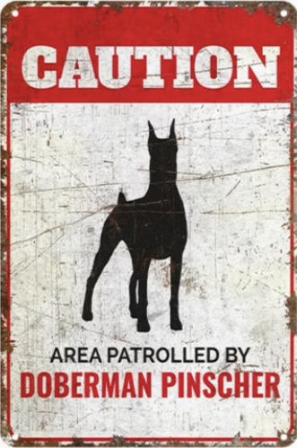 Caution Area Patrolled By Doberman Pinscher